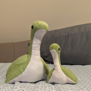 nessie from respawn plushie, one large and one small