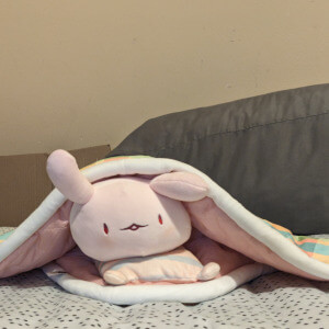 manta ray plushie with a blanket as the wings